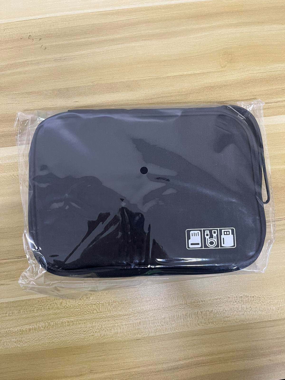 Black travel organizer pouch prize